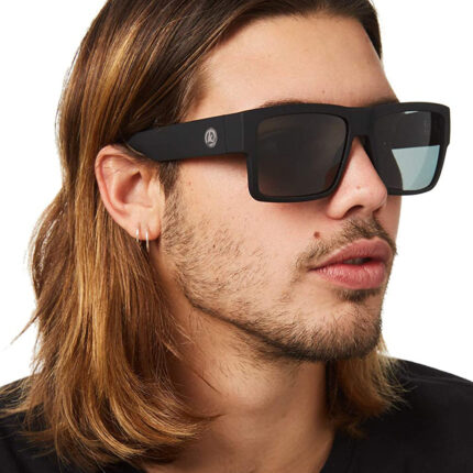 Fashionable colored glasses for men. Trendy sports glasses for men