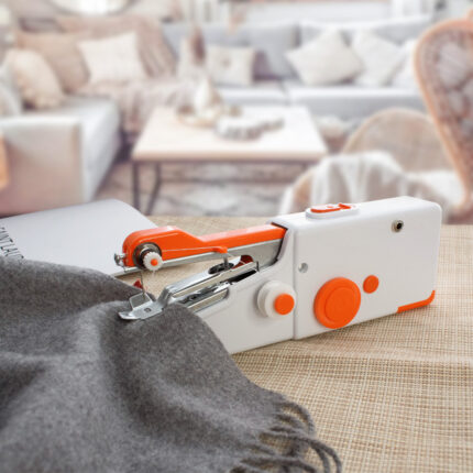 Mini handheld portable sewing machine