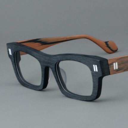 Glasses with thick lenses and a retro patchwork frame
