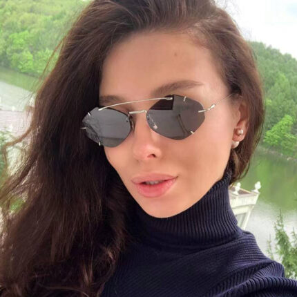 Fashionable metal frameless sunglasses for women